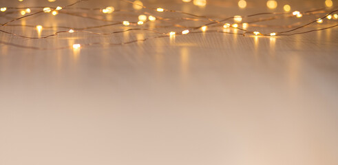 Christmas lights on background with copy space. Decorative garland