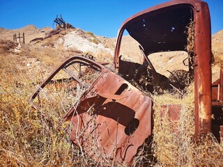 rusty truck wreck on the  old mining island of Serifos, Greece