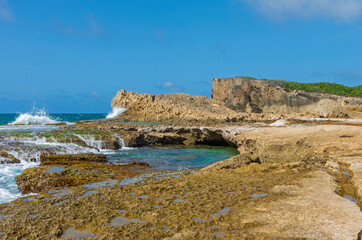 Fototapeta na wymiar cliffs tidal pools and rock ledges of punta las tunas