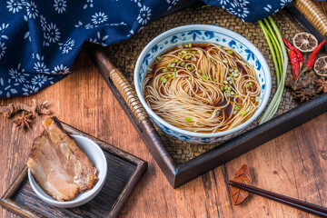 A bowl of Aozao noodles with braised pork, a traditional snack in Suzhou, Jiangsu, China