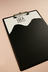 Lost stolen idea word idea written on a piece of paper and their competitors stole a white sheet on a folder A4 clipboard concept photo.