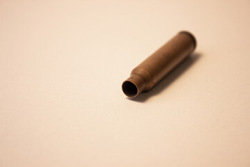 Bullet case isolated on white background. Bulletcase. Weapon bullet