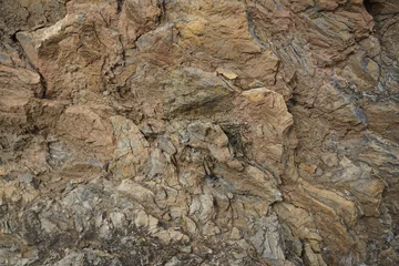 Brown gray rock texture. Stone background. Light brown rough background. Sandstone. Stone surface with cracks. © Наталья Босяк