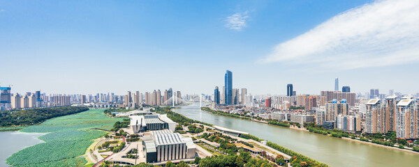 Qintai Grand Theater in Wuhan, Hubei, China and sunny scenery of Hanjiang City © Govan