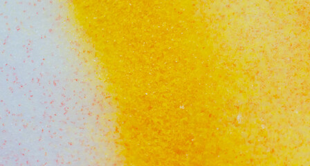 Yellow paint on the snow in winter.