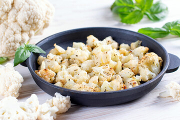 Roasted cauliflower with herbs and spices. Healthy concept, vegetarian food