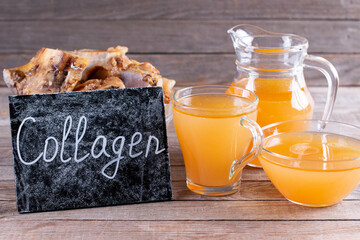 Homemade beef bone broth with natural collagen. Bouillon in glass dish