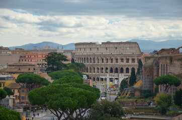 Fototapeta na wymiar Panorama of Rome city with ancient buildings and trees