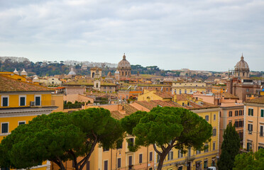 Fototapeta premium Panorama of Rome city with ancient buildings and trees