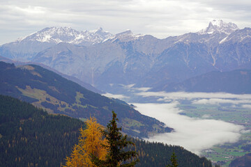 beautiful view in the morning to the snow capped alps in austria in autumn