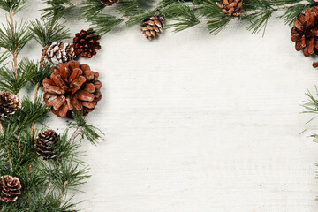 Naklejka na ściany i meble Happy New Year 2020 greeting card. Christmas branches on rustic wooden background. Space for text. Top view