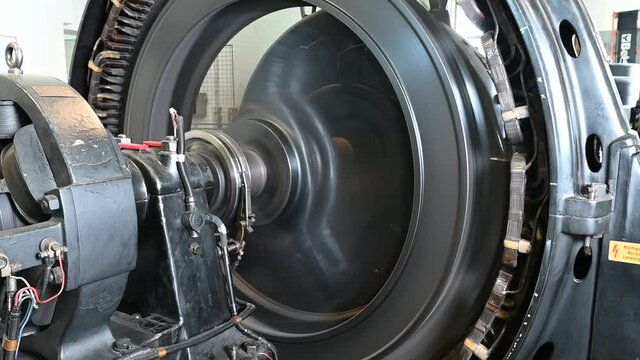 close up of a generator wheel producing electricity