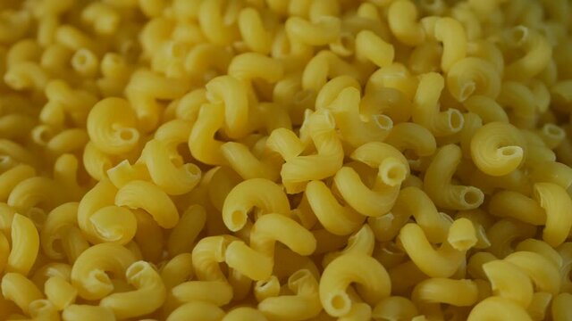 a lot of pasta close-up. Macron products close, rotating. View from above. 4k