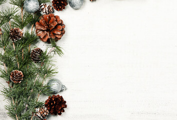 Happy New Year 2020 greeting card. Christmas branches on rustic wooden background. Space for text....