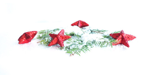 christmas banner red stars with glitter on snow-covered fir branches on a white background.
