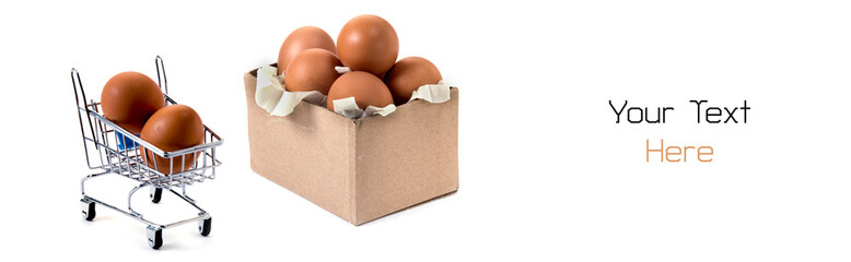 Box and trolley with two eggs isolated on white background