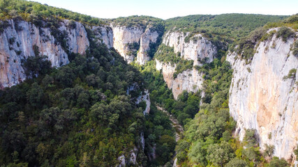Steep canyon surrounding a river