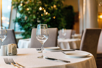  Served dinner table in a restaurant. Restaurant interior