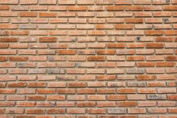 brick walls background and texture. The texture of the brick is orange. Background of empty brick basement wall.