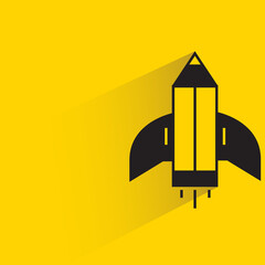 pencil rocket with shadow yellow background