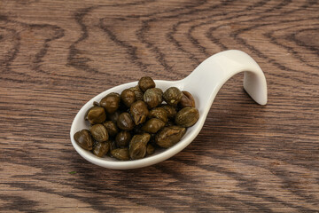 Tasty capers in the bowl