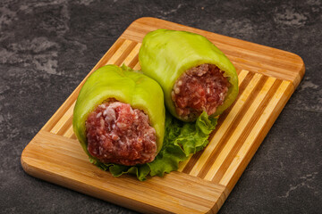 Raw stuffed pepper for cooking