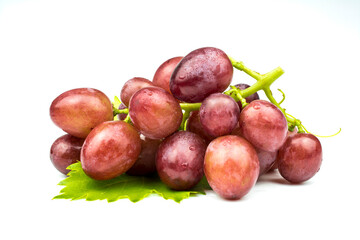 Fototapeta na wymiar Bunch of pink grapes isolated on white background.