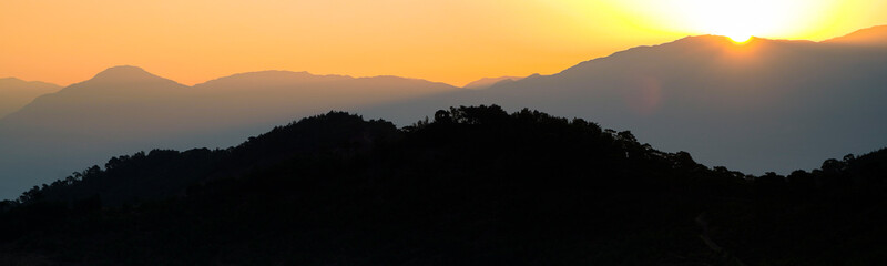 Panoramic sunset over mountains