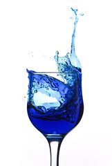 splash of drink in a beautiful crystal glass