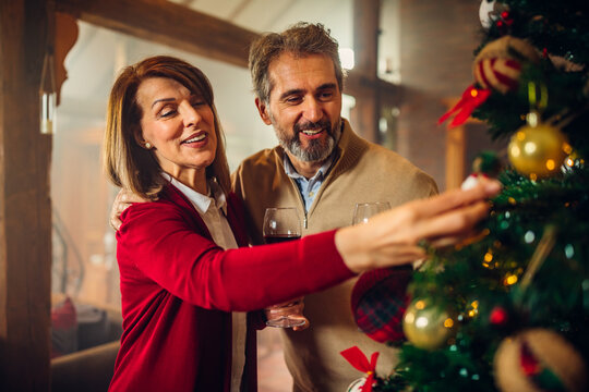 Nothing gets you in the spirit like decorating the tree - Powered by Adobe