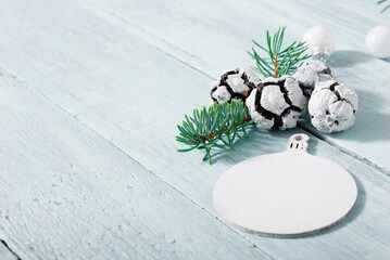 old style Christmas ornaments on bright wooden table background