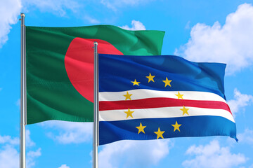 Cape Verde and Bangladesh national flag waving in the windy deep blue sky. Diplomacy and international relations concept.