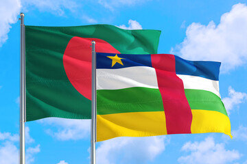 Central African Republic and Bangladesh national flag waving in the windy deep blue sky. Diplomacy and international relations concept.