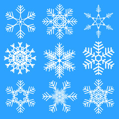 Fototapeta na wymiar Snowflakes set on blue background. isolated snowflake white silhouette. Christmas season design elements.