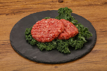 Raw beef burger cutlet for cooking