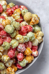 Homemade popcorn on on colorful backgrounds