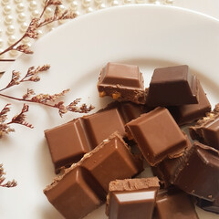 Broken chocolate in a plate