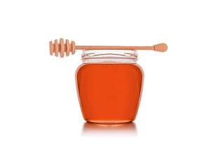 Jar with honey isolated on white background.