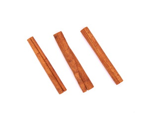 Cinnamon sticks on white background