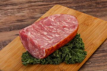 Beef ham piece over board