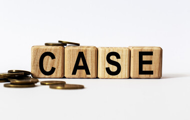 wooden cubes and case, coins, the concept of taxation, increase taxes and fees