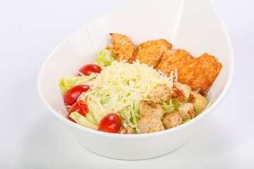 Caesar salad with chicken and parmesan