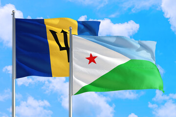Djibouti and Barbados national flag waving in the windy deep blue sky. Diplomacy and international relations concept.
