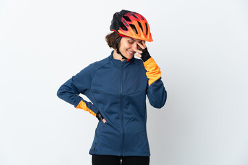 Young English cyclist woman isolated on white background laughing