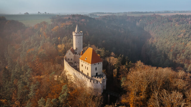 Aerial fall view of old stone Kokorin Castle built in 14th century.It lies in the middle of nature reserve on a steep rocky spur above the Kokorin Valley.Popular historical monument in Czech republic