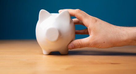 Obraz na płótnie Canvas white piggy bank insurance money