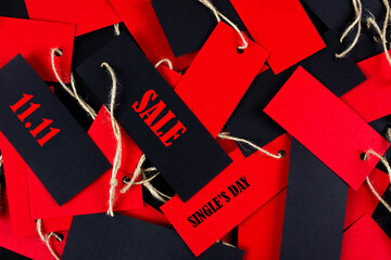 Online shopping of China. 11.11 single day sale concept. Red and black ticket with copy space. Flat lay.