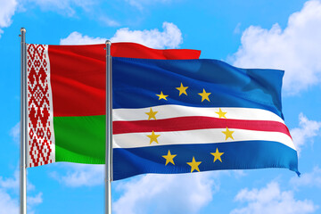 Cape Verde and Belarus national flag waving in the windy deep blue sky. Diplomacy and international relations concept.