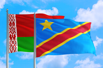 Congo and Belarus national flag waving in the windy deep blue sky. Diplomacy and international relations concept.