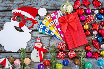 Christmas ornaments with stars, baubles and fir tree on the blue table background